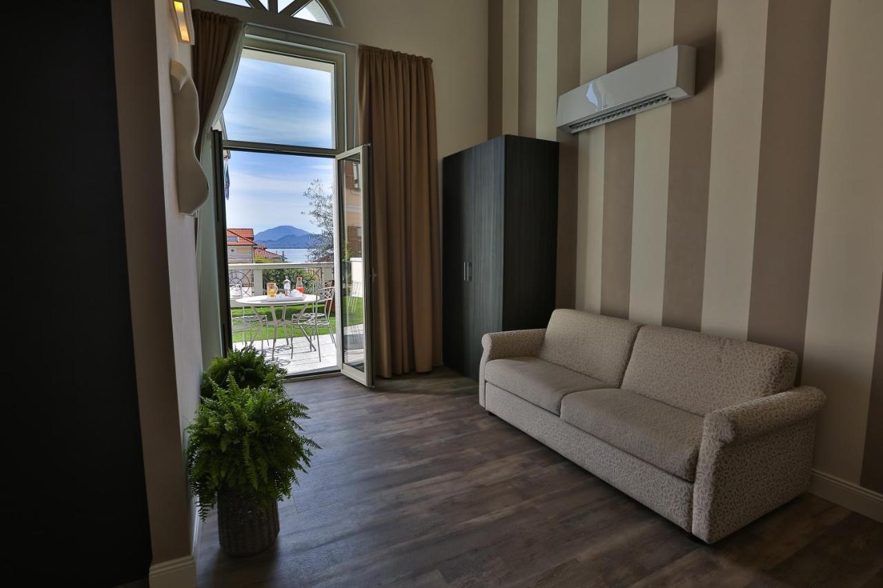 Hotel Al Campanile - Luxury Suites & Apartments Бавено Экстерьер фото
