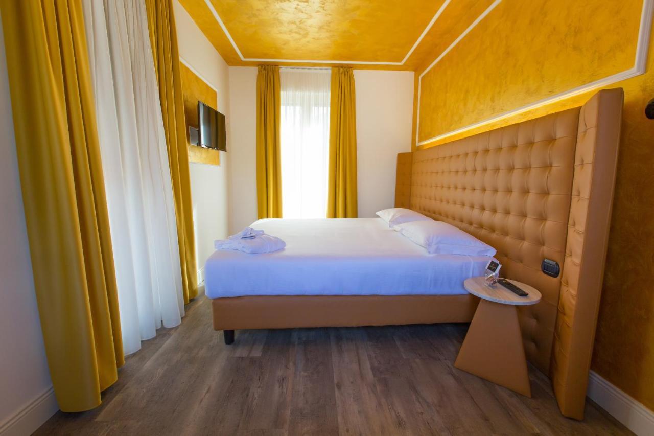 Hotel Al Campanile - Luxury Suites & Apartments Бавено Экстерьер фото