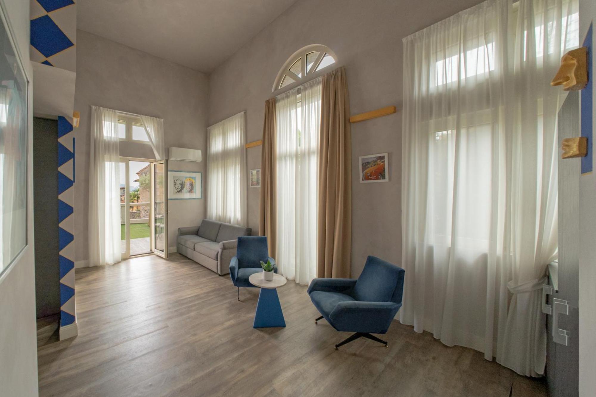 Hotel Al Campanile - Luxury Suites & Apartments Бавено Экстерьер фото
